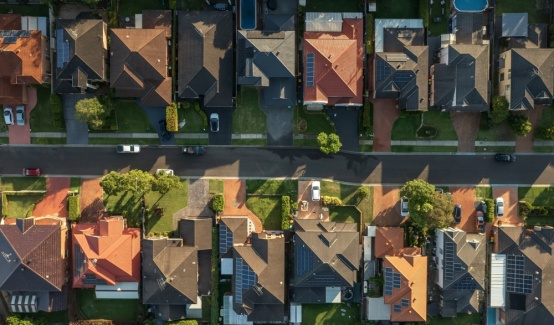 Top,down,aerial,view,of,a,neighbourhood,street,lined,with